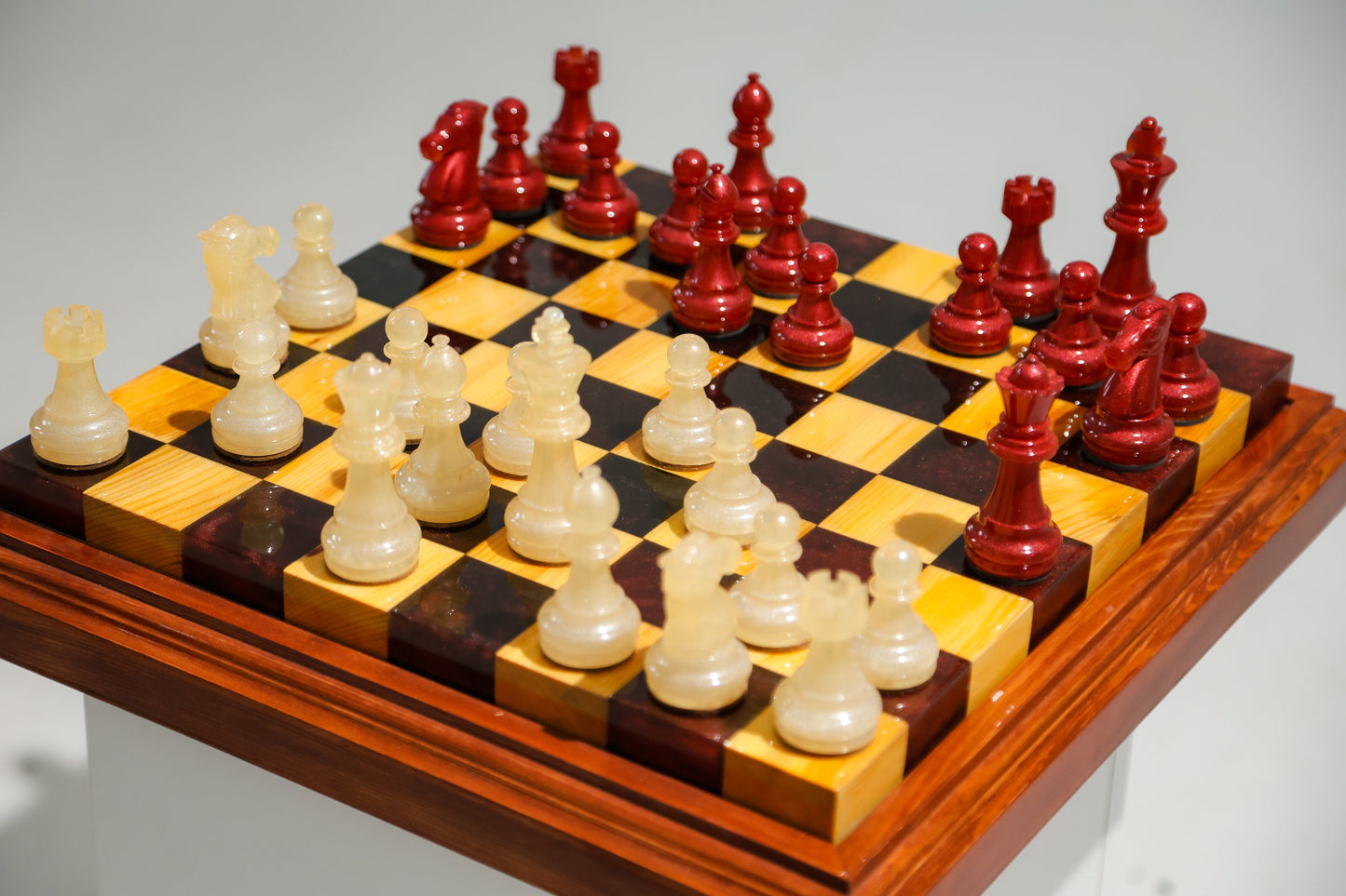 Granadas Crimson Pearl Chess Set – lifestyle photo in a home interior setting