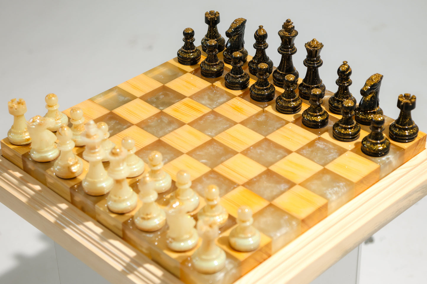 Granadas Amethyst Glow Chess Set – side angle showing the board and frame