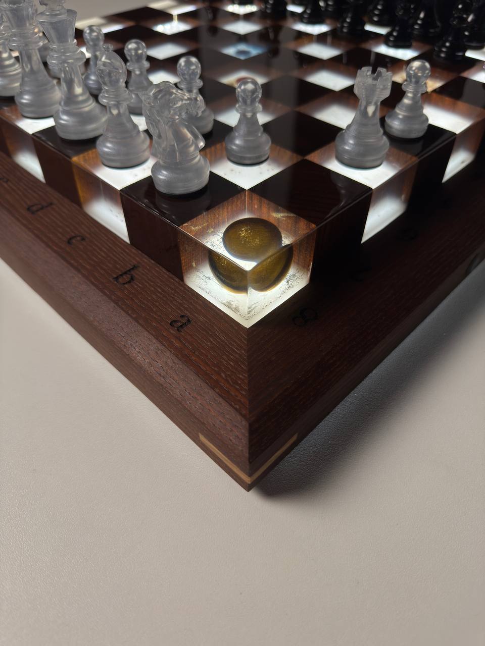 Granadas Space Chess Set – close-up of the space-inspired dark wood and crystal-clear epoxy resin pattern on the board
