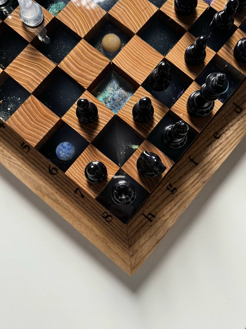 Granadas Space Chess Set – detail of the handcrafted wood grain and resin edge